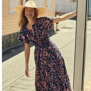 Anthropology Dress. Sizes L or XL stretch at waistline open front hook closure.